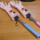 Illustration for article titled Embarrassed By Selfie Sticks, Man Creates a "Selfie Arm"